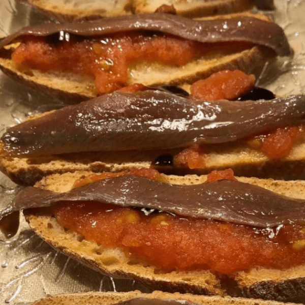Tostas anchoas y tomate imagen destacada