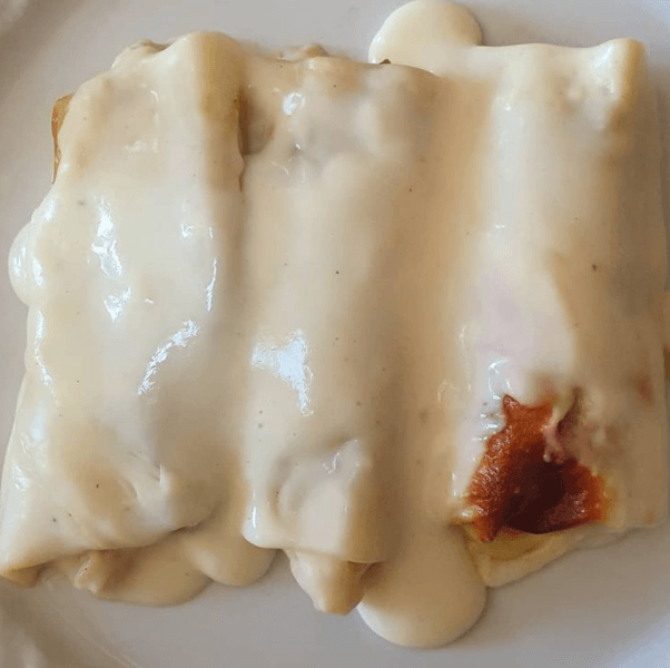 Canelones de alcachofas y langostinos imagen destacada